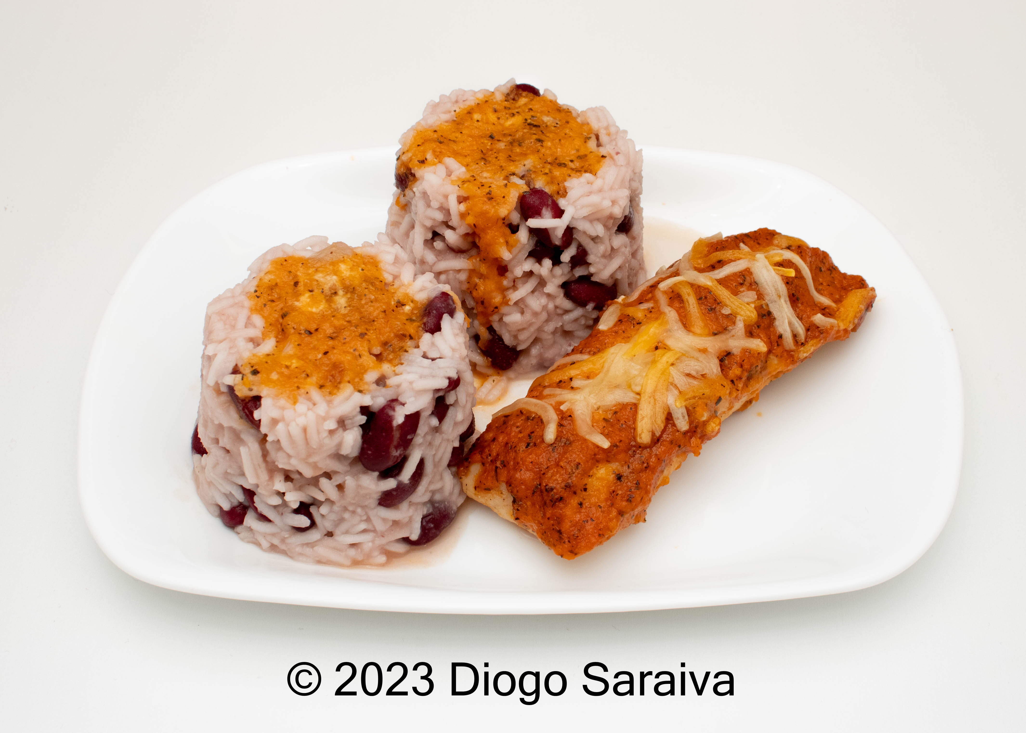 Oven-Baked Hake Medallions with Bean Rice